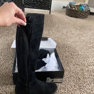 Black high flat boots